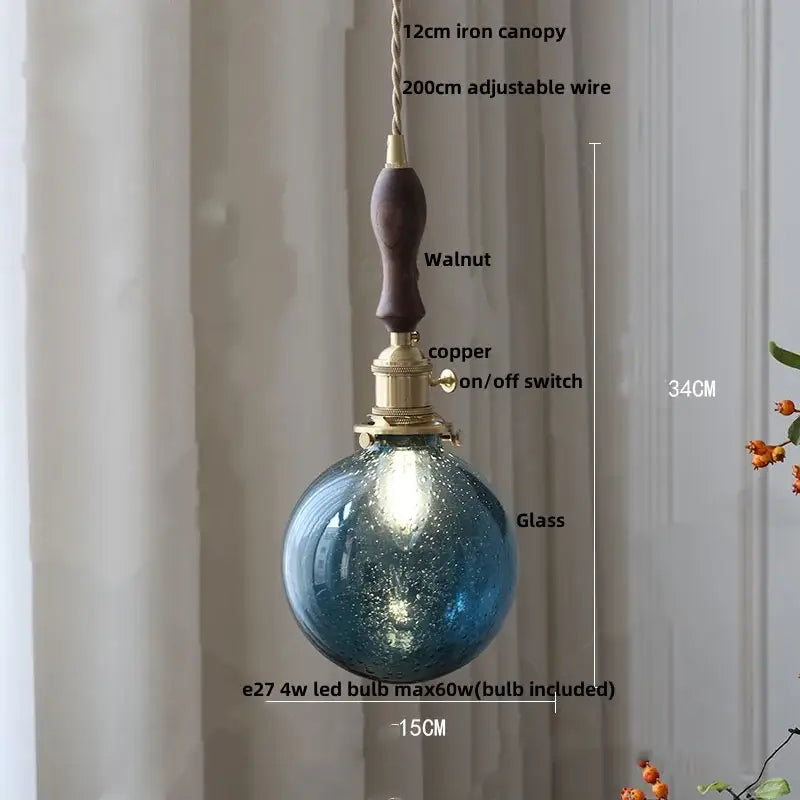 Modern lime and teal blue bubble glass ball pendant light with blue textured glass and walnut iron canopy by decorbites
