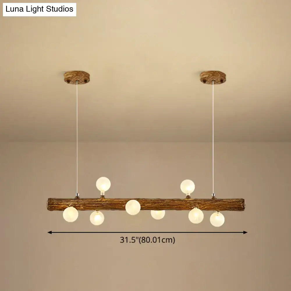 Rustic wooden log pendant light with six frosted glass globes in brown metal modern linear island pendant lamp