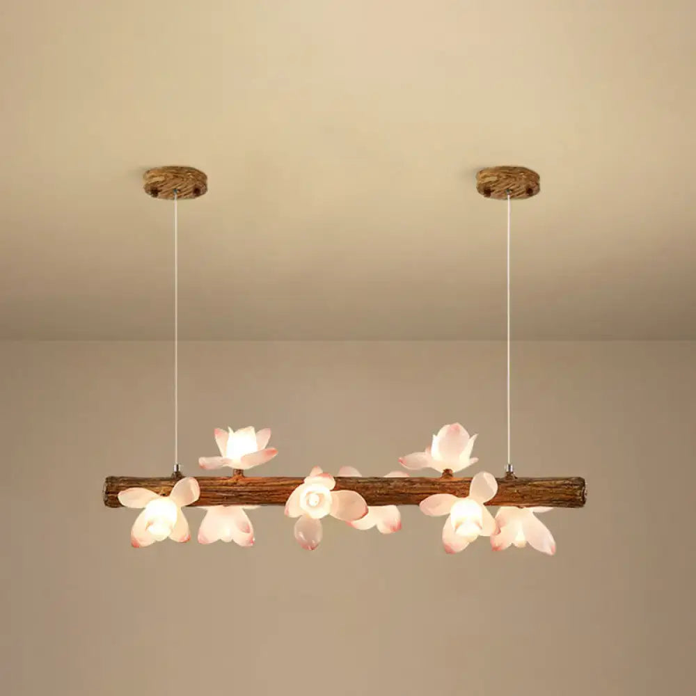 DecorBites™ brown modern linear island pendant metal lamp with rustic wooden branch and pink flower-shaped lights