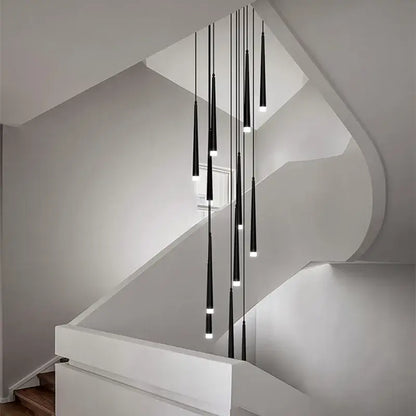 Modern loft black led stair chandelier with black cylindrical pendant lights hanging above staircase decorbites loft black