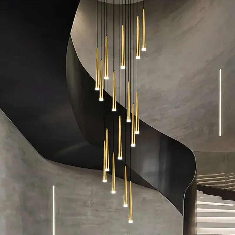 Golden slender pendant lights in a cascading arrangement for modern loft black led stair chandelier living room decorbites loft black