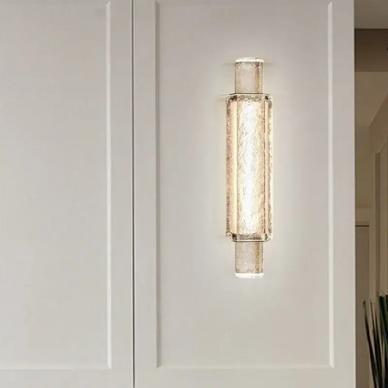 Modern luxe gold crystal glass wall lamp with textured translucent body and metallic accents for bedroom decorbites elegant bubble