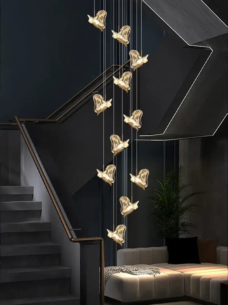 Modern luxury butterfly gold decorbites crystal chandelier with sleek metallic finish hanging in living room interior