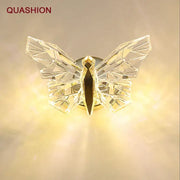 Modern luxury crystal butterfly wall lamp with gold-toned accents and faceted glass wings for bedroom decorbites decor