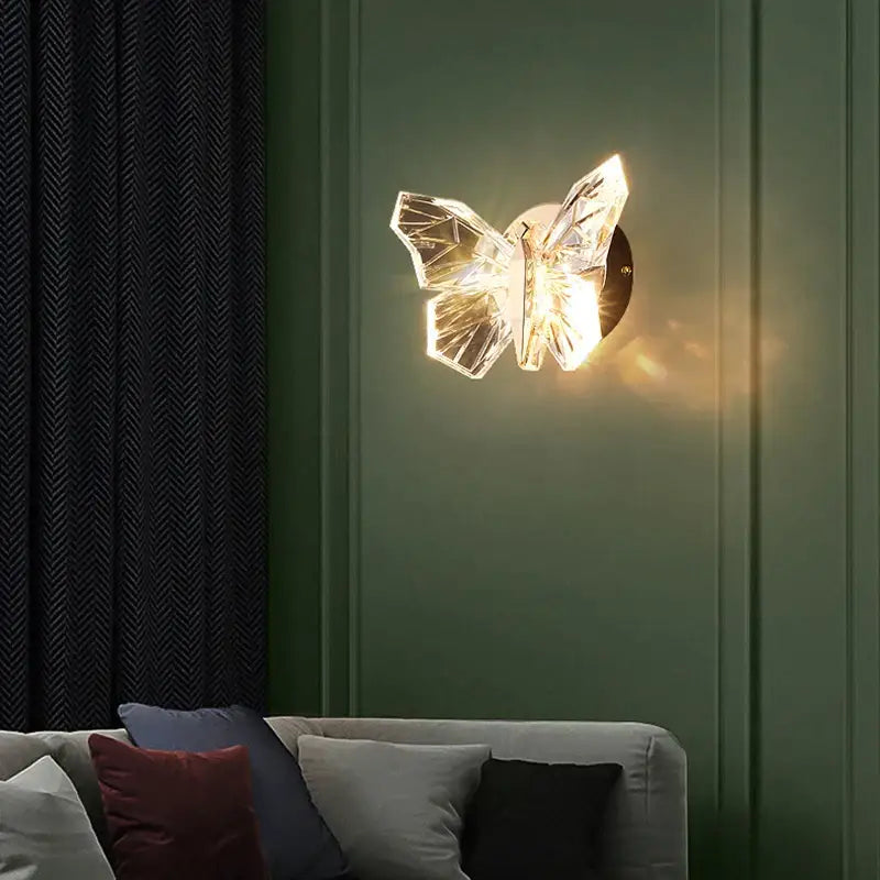 Modern luxury crystal butterfly wall lamp with faceted wings and warm glow for bedroom decorbites butterfly wall lamp