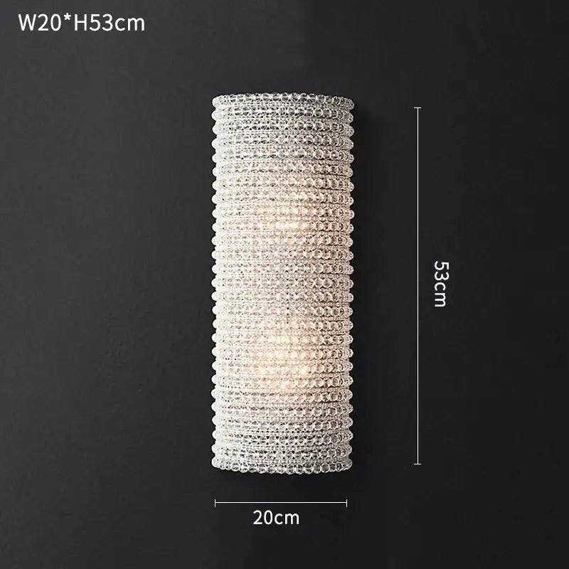 A tall cylindrical pendant light with clear faceted crystals for modern luxury decorbites crystal circle chandelier