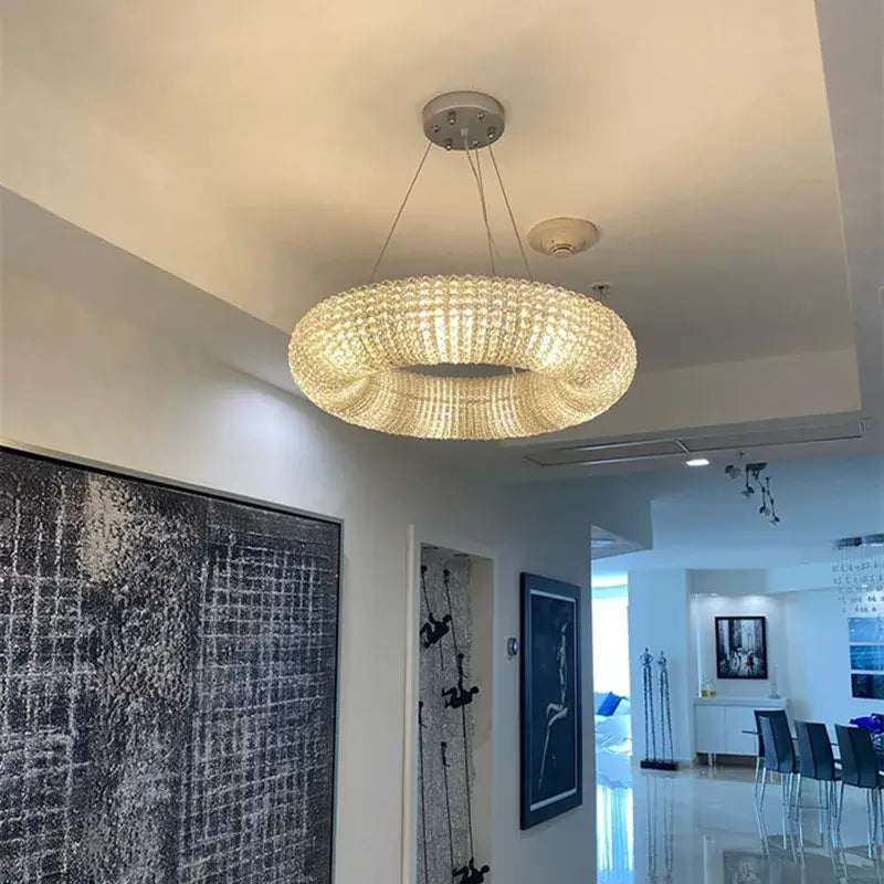 Modern luxury crystal circle chandelier pendant light with clear crystal beads and metallic ceiling mount for living room decorbites