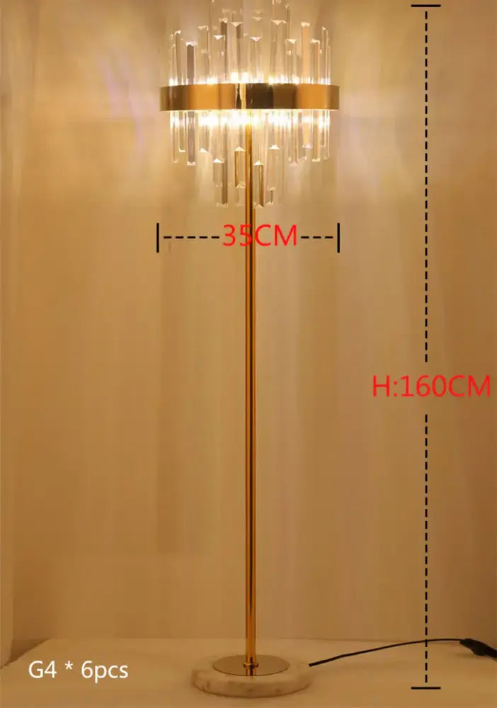 Modern luxury crystal gold floor lamp with slender pole and chandelier-style cascading prisms for living room decorbites crystal gold