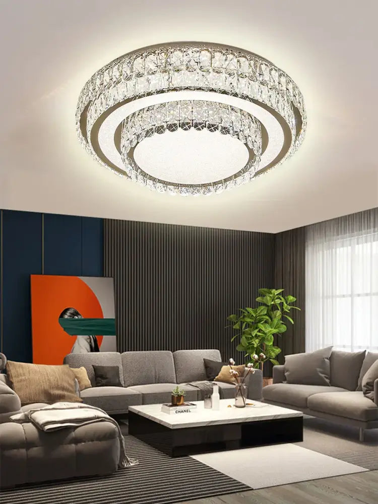 Modern luxury crystal led ceiling lamp featuring multiple clear crystal rings and a frosted glass diffuser for bedroom decorbites crystal led ceiling lighting