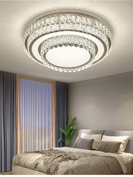 Modern luxury crystal led ceiling lamp with concentric clear faceted crystals and central illuminated panel decorbites crystal led