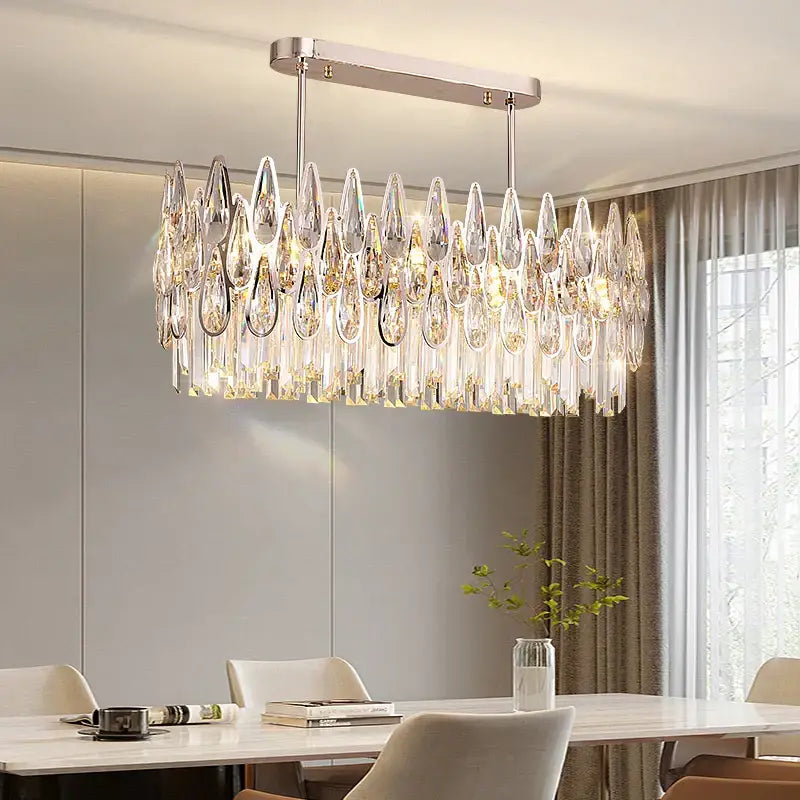 Modern luxury crystal led chandelier with sleek chrome frame and teardrop pendants by decorbites crystal led
