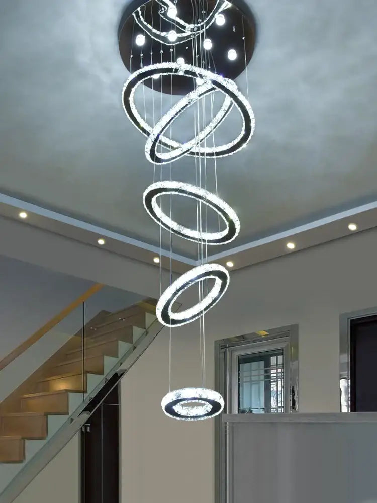 Modern luxury decorbites crystal rings chandelier with glowing circular rings for staircase lighting fixture