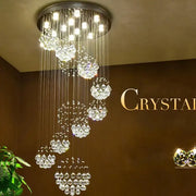 Modern luxury crystal staircase chandelier with cascading clear faceted glass beads and black ceiling mount decorbites crystal staircase