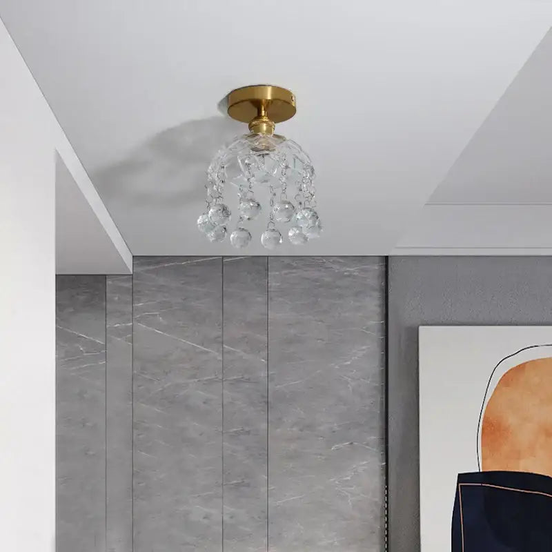 Modern luxury decorbites crystal glass ceiling lamp with gold-toned base and clear glass beads for living room light