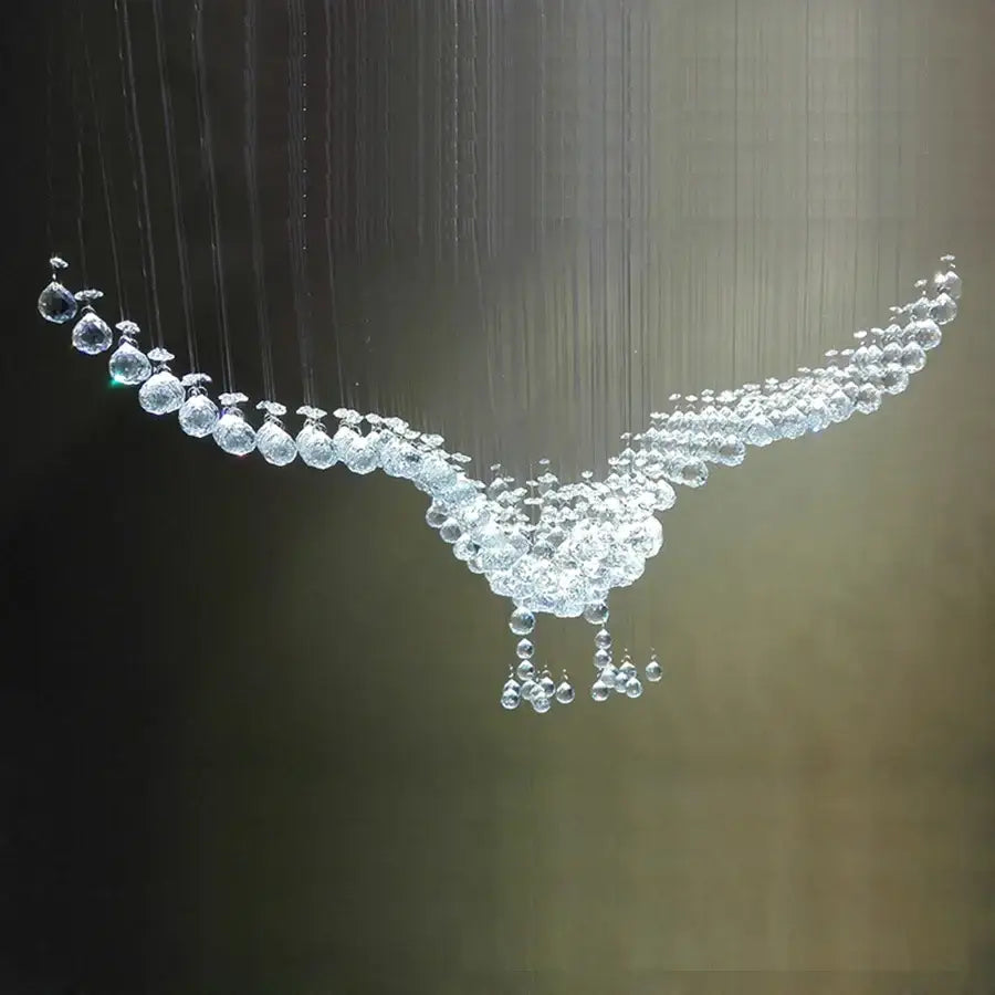 Modern luxury eagles crystal chandelier shaped like a bird in flight with clear faceted glass beads for living room lighting