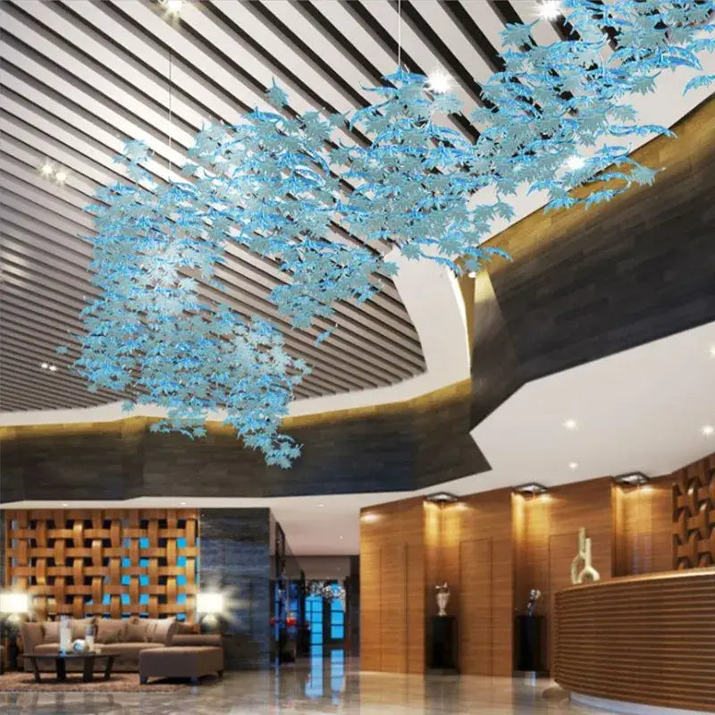 A delicate translucent blue glass high ceiling led chandelier shaped like cascading leaves for modern decorbites glass high ceiling rooms