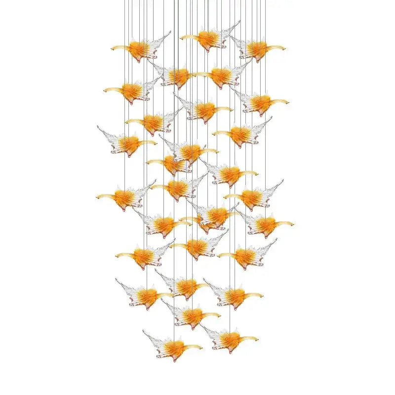 A modern luxury glass high ceiling led chandelier with translucent orange and clear bird-shaped pendants decorbites glass high