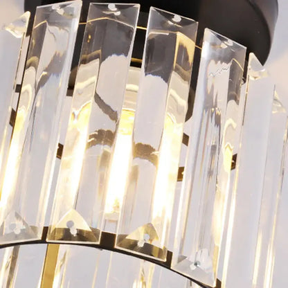 Modern luxury gold and black ceiling light featuring clear faceted crystal bars in a decorbites crystal aisle corridor design