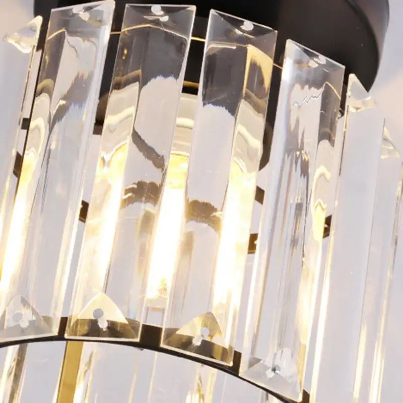 Modern luxury gold and black ceiling light featuring clear faceted crystal bars in a decorbites crystal aisle corridor design