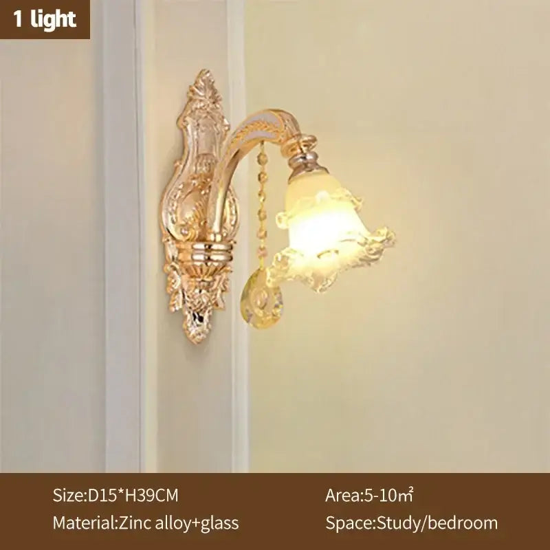 Modern luxury gold-toned ornate wall sconce with glass bell shade and decorative chain for crystal ceiling chandelier decorbites