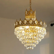 Modern luxury gold crystal crown chandelier with cascading clear and faceted crystals by decorbites crystal crown