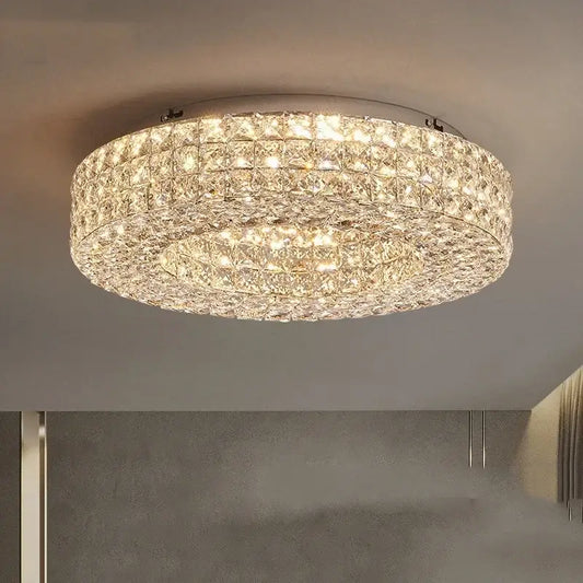 Modern luxury gold crystal led ceiling chandelier featuring clear faceted crystals refracting warm light for living room decorbites crystal led