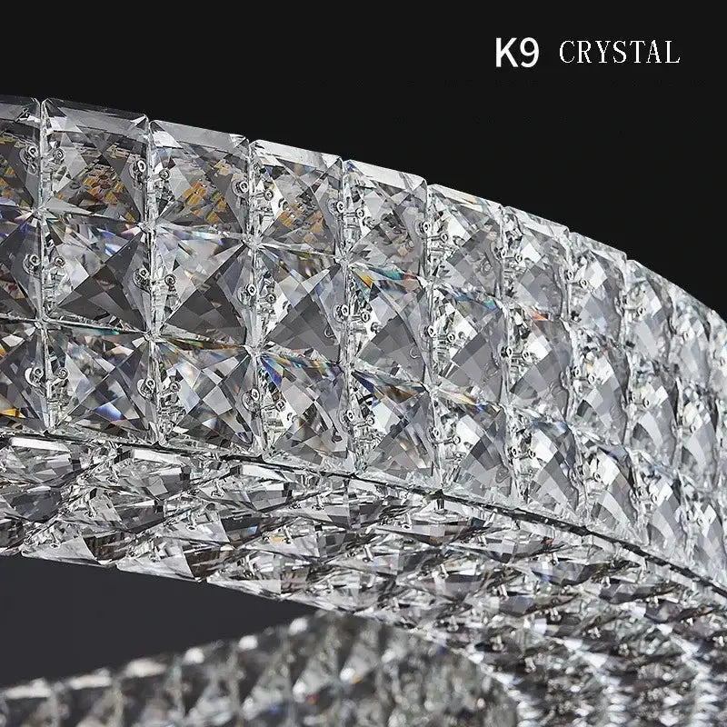Modern luxury gold crystal led ceiling chandelier with sleek k9 crystals in an elegant curved design for living room decorbites crystal led