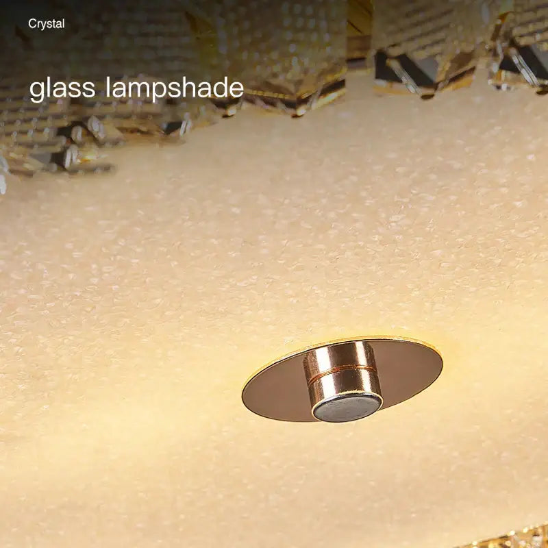 Modern luxury gold crystal round ceiling lamp featuring a warm-toned decorbites crystal round glass lampshade