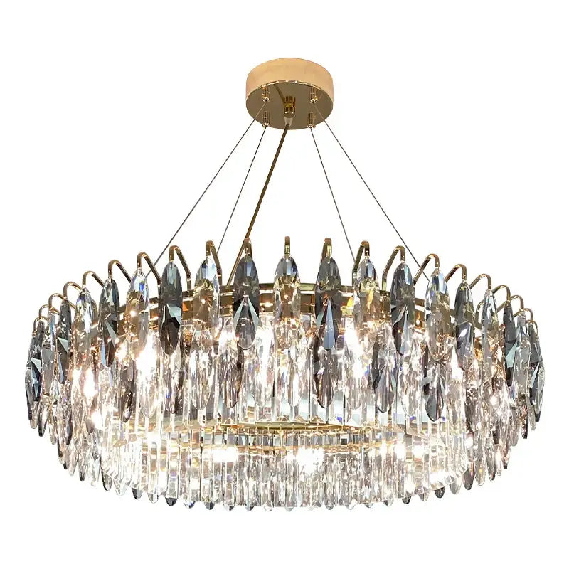 Modern luxury gold decorbites crystal atmosphere chandelier with clear faceted crystals on a brass frame for dining room