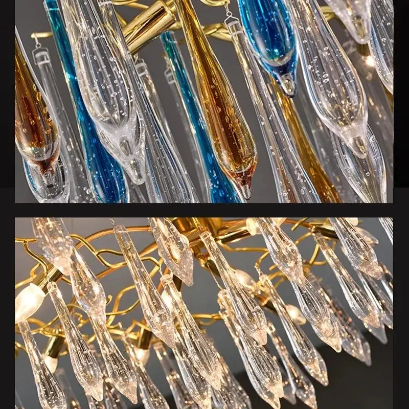 Modern luxury golden crystal water drop led chandelier with teardrop glass pendants in clear blue and amber hues for dining room decorbites crystal water