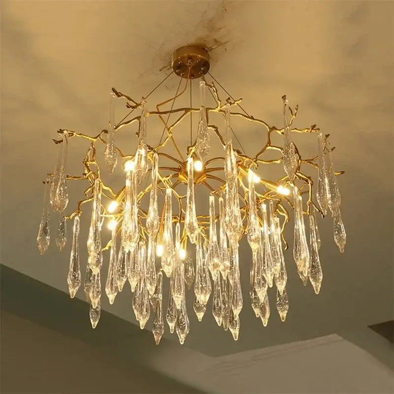Modern luxury golden crystal water drop led chandelier with branch-style design and dangling crystal teardrop pendants