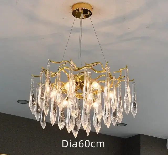 Modern luxury golden crystal water drop led chandelier with gold-toned frame and clear teardrop crystal droplets for dining room decor