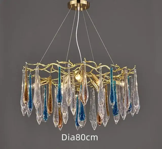Modern luxury golden crystal water drop led chandelier with a golden frame and glass teardrop pendants in clear blue and amber hues