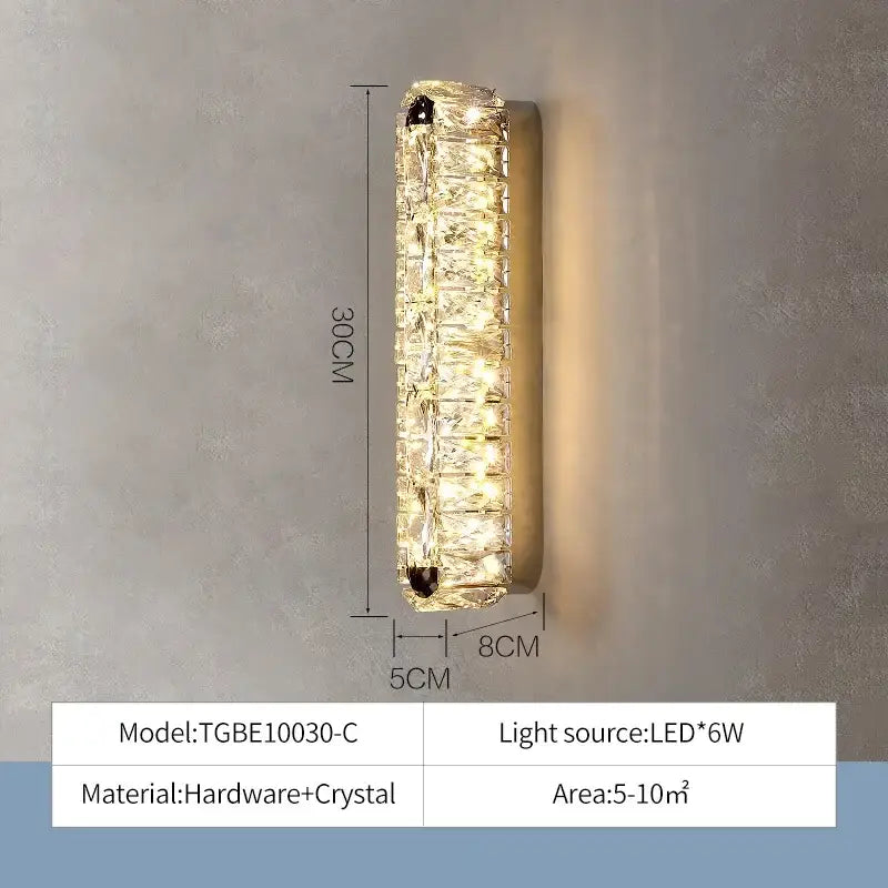 A 30cm modern wall sconce with clear faceted crystal segments refracting warm led light for decorbites crystal ceiling