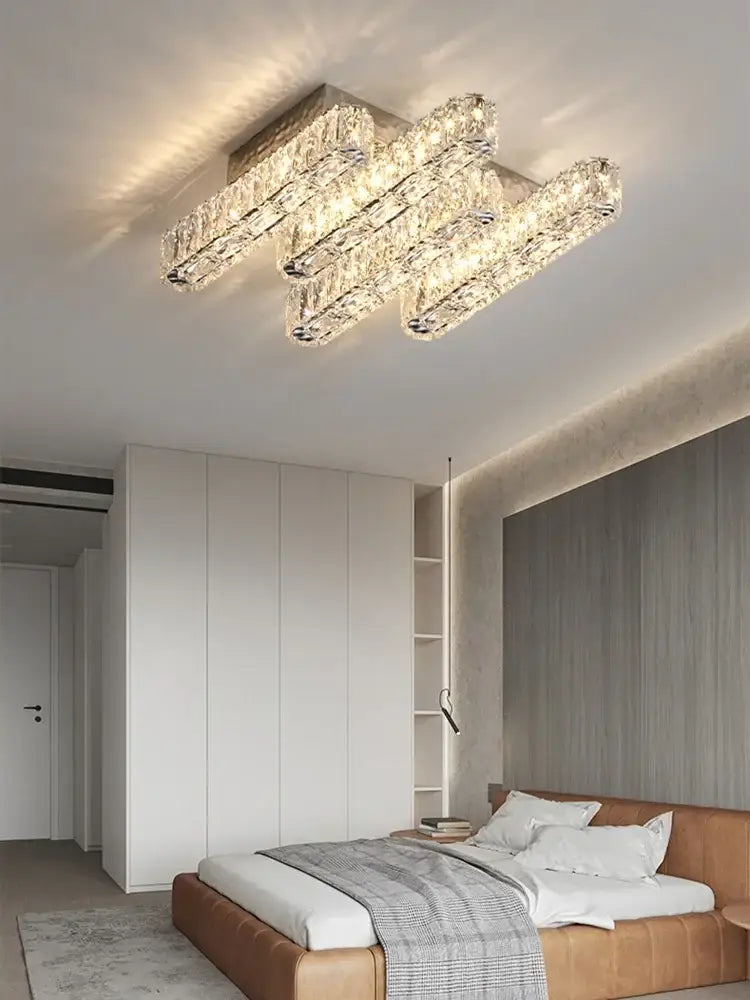 Modern luxury rectangular crystal ceiling chandelier with three horizontal faceted glass bars for warm ambient lighting