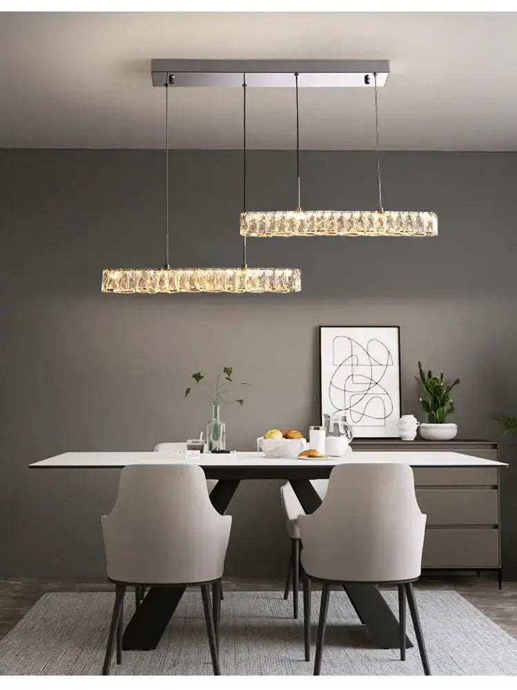 Two modern luxury rectangular decorbites crystal ceiling chandeliers with faceted glass and chrome frame for living room lighting