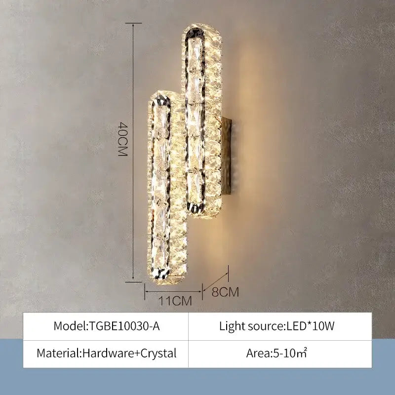 A modern luxury crystal ceiling chandelier with two vertical crystal-encrusted bars and a sleek metallic base for decorbites decor