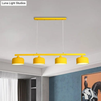 Decorbites modern macaron drum chandelier with bright yellow metal shades and adjustable chain cord length for dining table