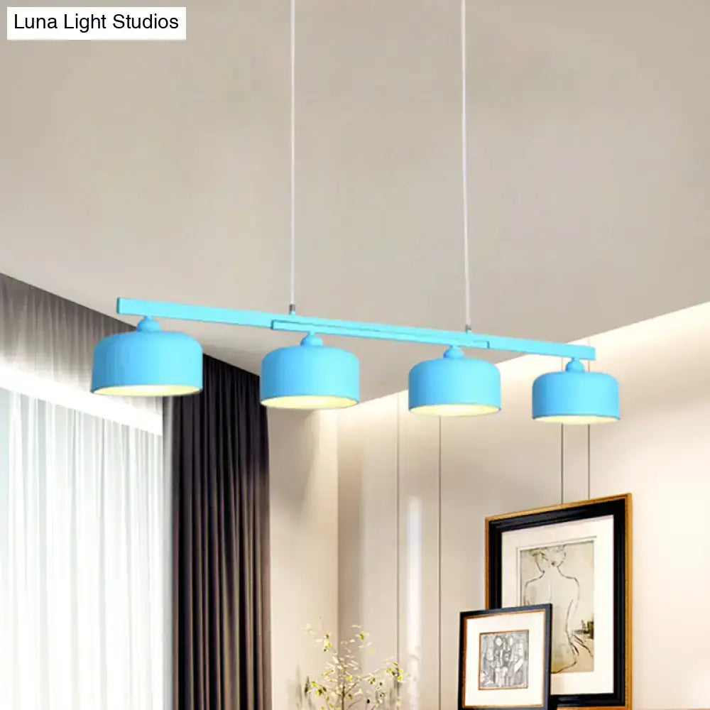 DecorBites™ modern macaron drum chandelier with four bright blue metal shades and adjustable chain cord length for dining table