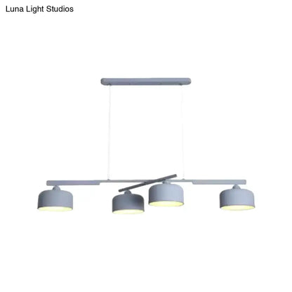 DecorBites™ modern gray metal pendant light fixture with three cylindrical shades and adjustable chain cord length