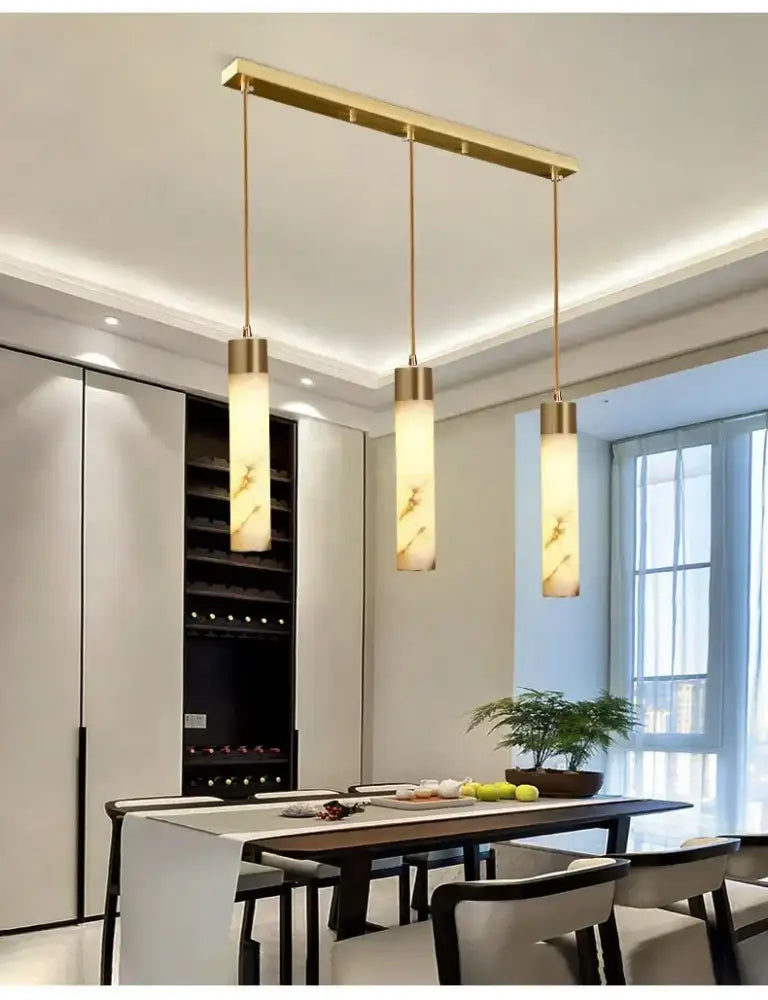 Modern marble and copper led pendant light featuring gold-toned rectangular frame with three amber marble shades decorbites copper led pendant