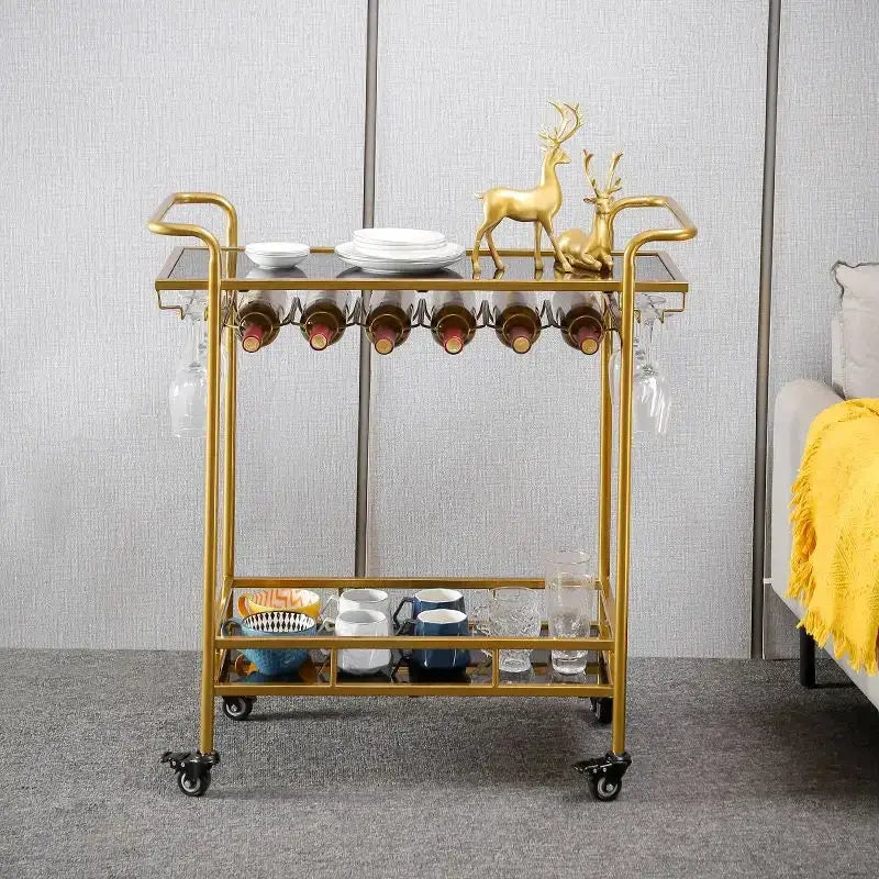 Modern marble and gold drinks trolley with gold-finished metal frame, glass shelves, and black caster wheels decorbites drinks trolley