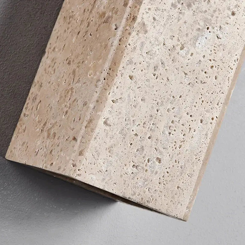 Beige textured decorbites cuboid stone led wall lamp with subtle speckled pattern and smooth beveled edges for bedroom decor