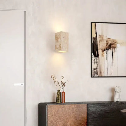 Beige marble-textured modern cuboid stone led wall lamp from decorbites with warm soft glow bedroom sconce set