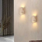 Two elegant rectangular wall lamps in light-colored marble with natural veining from decorbites cuboid stone led set