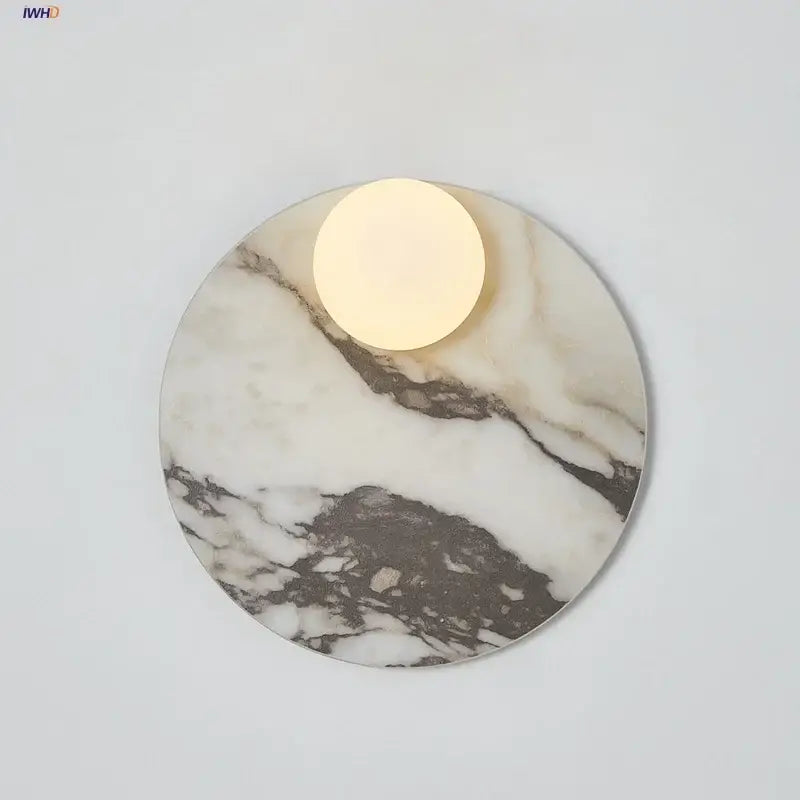 Modern marble glass globe led wall lamp featuring a circular marble sconce with warm glowing glass globe led light