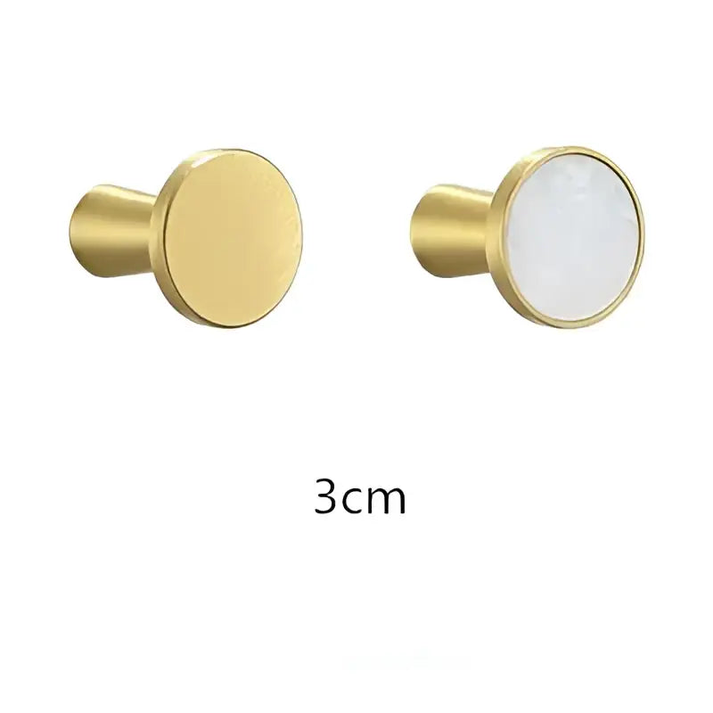 Modern marbled stone and decorbites brushed gold towel hook with smooth and opal stone gold-toned cabinet knobs