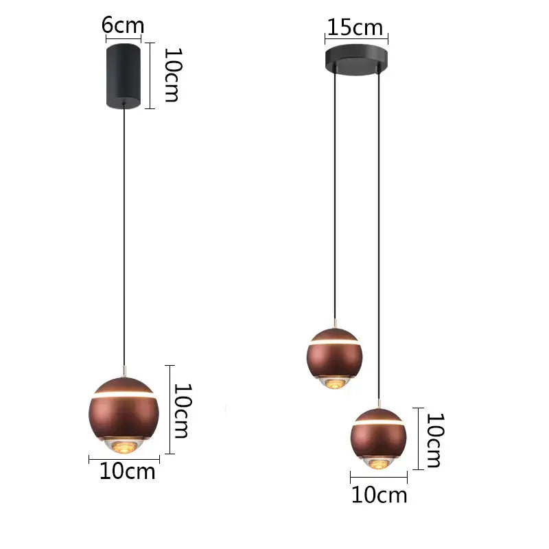 Modern matte copper ball pendant lights with sleek minimalist design and black hardware for bedroom and kitchen island