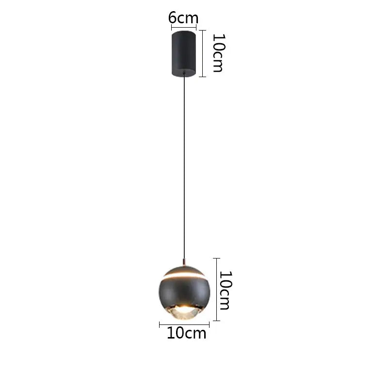 Modern matte black ball pendant light with 10cm diameter suspended by thin cord for bedroom and kitchen island lighting