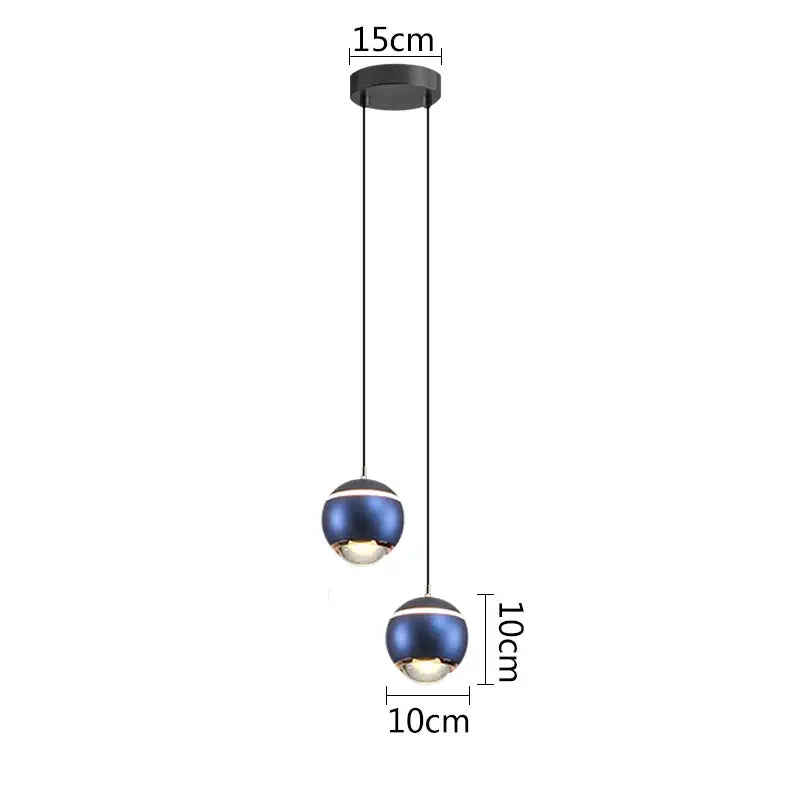 Modern matte blue ball pendant lights with black metal fixtures and cords for bedroom and kitchen island lighting